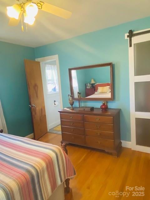 422 Mirror Lake Road Salisbury, NC 28146 - Photo 10 of 18 a bedroom with a bed and a dresser