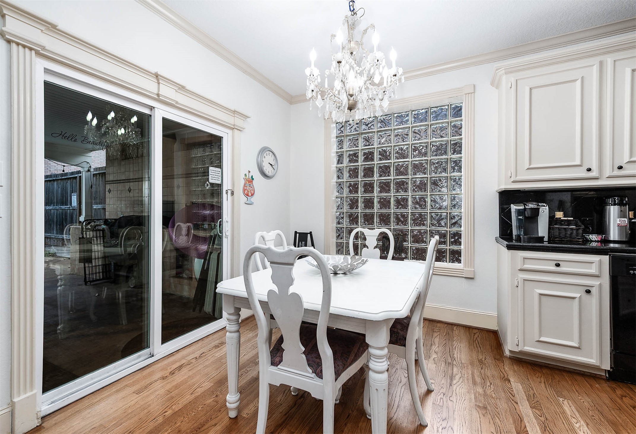 7110 Gary Street Houston, TX 77055 - Photo 12 of 50 a view of a dining room with furniture window and wooden floor