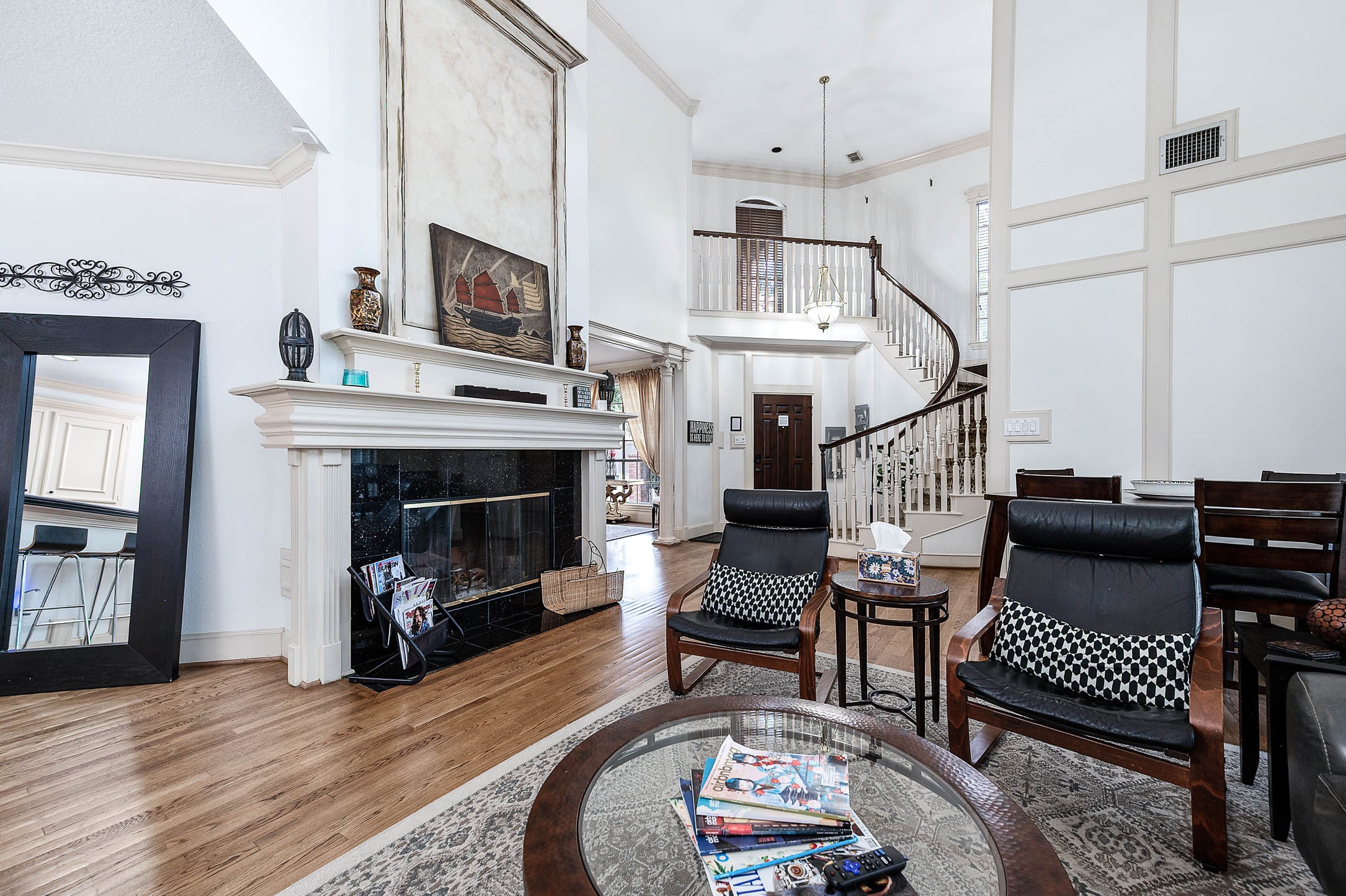 7110 Gary Street Houston, TX 77055 - Photo 5 of 50 a living room with furniture a fireplace and a flat screen tv