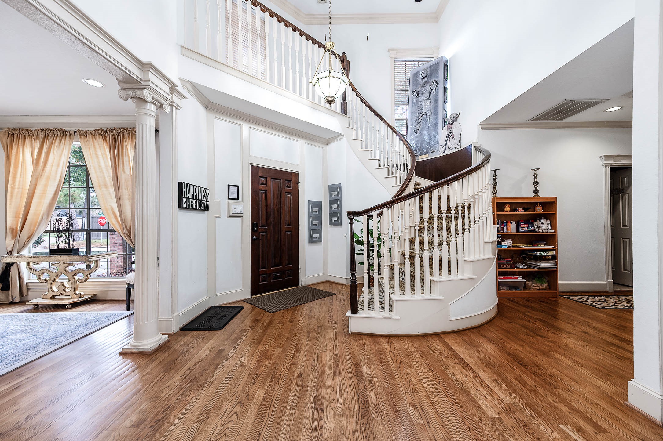 7110 Gary Street Houston, TX 77055 - Photo 8 of 50 a view of entryway with wooden floor and windows