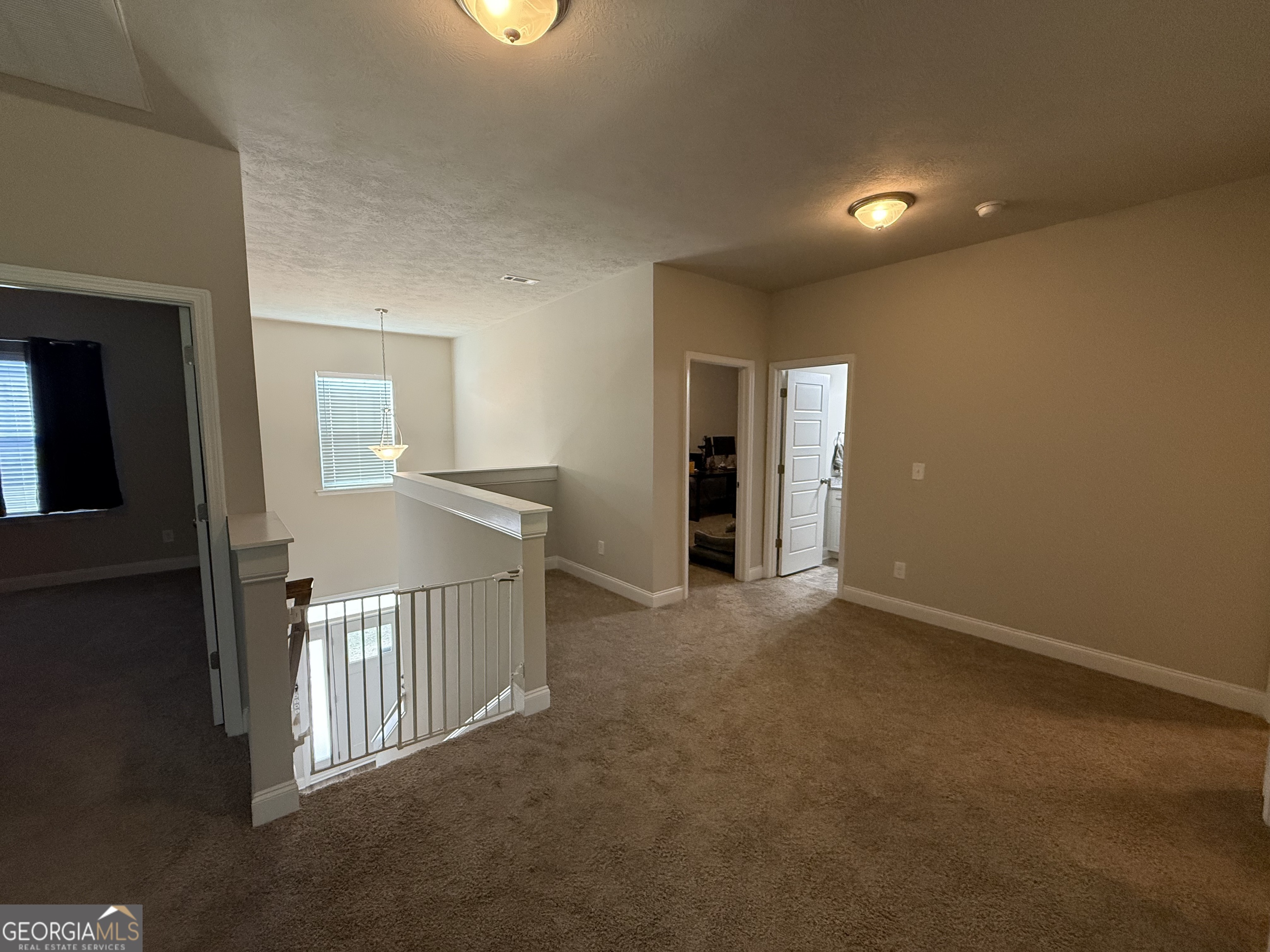 136 Pebble Lane Harlem, GA 30814 - Photo 15 of 30 a view of a hallway with closet area
