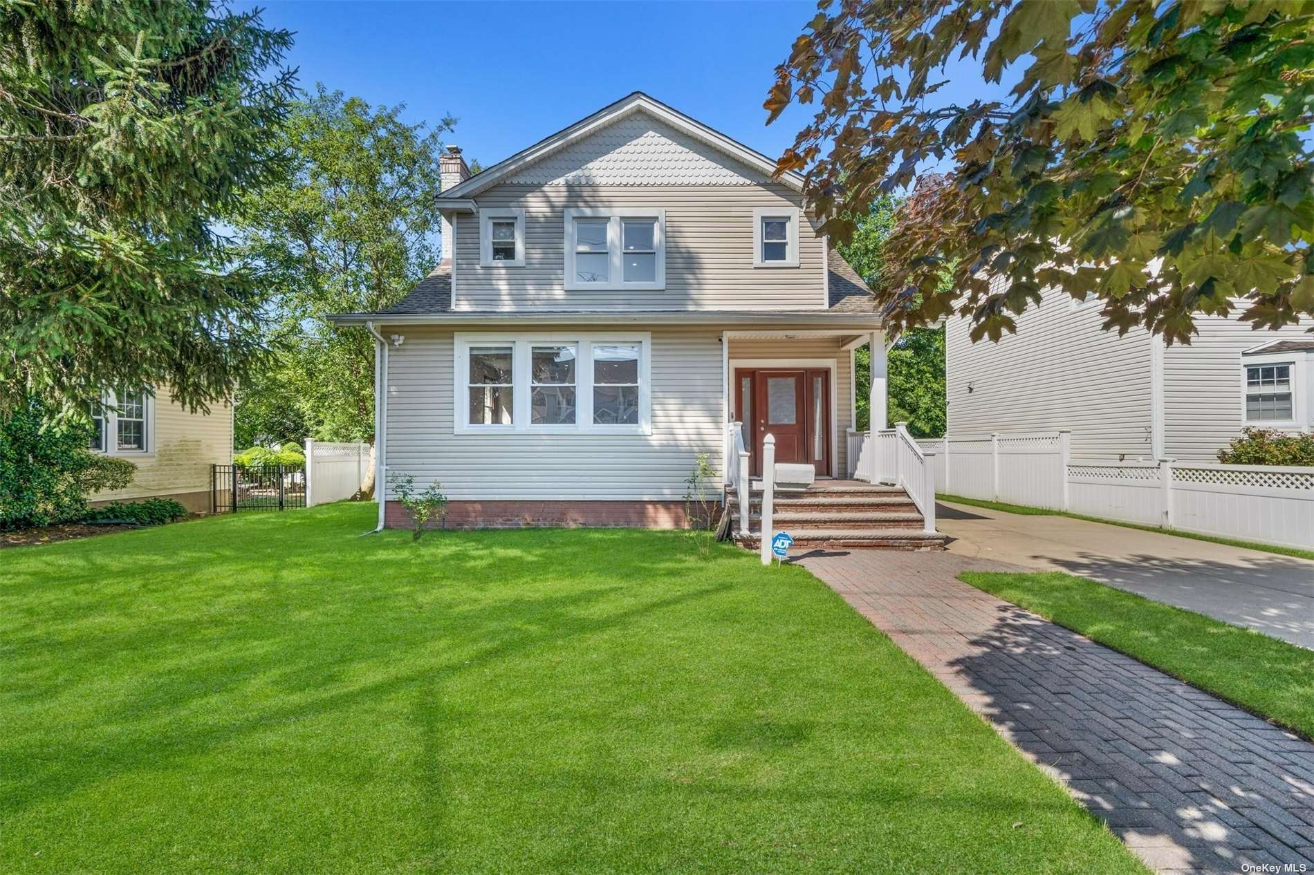 26 Hilbert Street Hempstead, NY 11550 - Photo 1 of 1 a view of front of a house with a yard