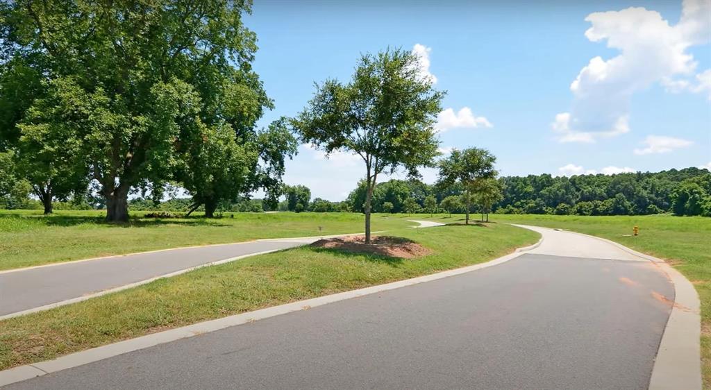 0 Cross Ridge, Unit 156 Shreveport, LA 71106 - Photo 4 of 13 a view of a park with large trees