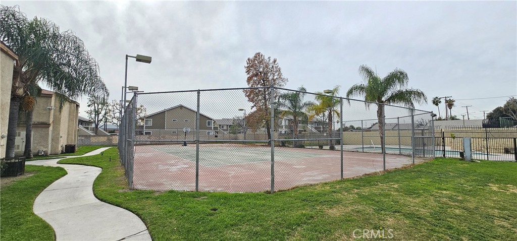 936 Fairway, Unit 23 Grand Terrace, CA 92324 - Photo 14 of 14 a view of a garden with a slide