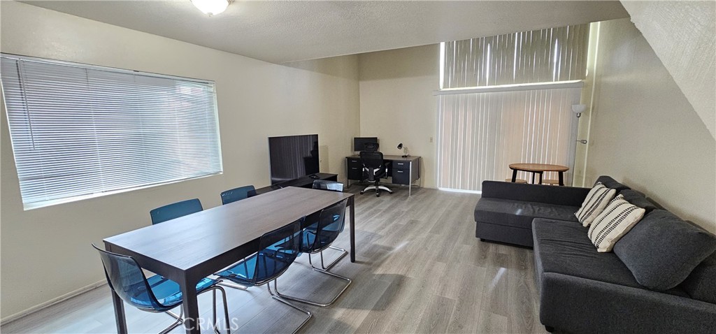 936 Fairway, Unit 23 Grand Terrace, CA 92324 - Photo 6 of 14 a view of a livingroom with furniture and a window