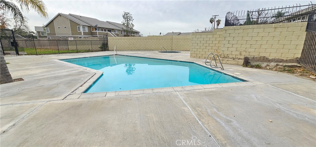 936 Fairway, Unit 23 Grand Terrace, CA 92324 - Photo 10 of 14 a view of outdoor space and swimming pool