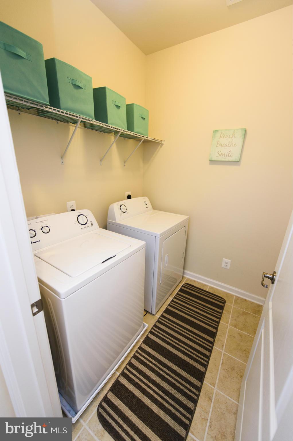 4878 Dane Ridge Circle, Unit 123 Woodbridge, VA 22193 - Photo 12 of 21 a utility room with dryer and washer