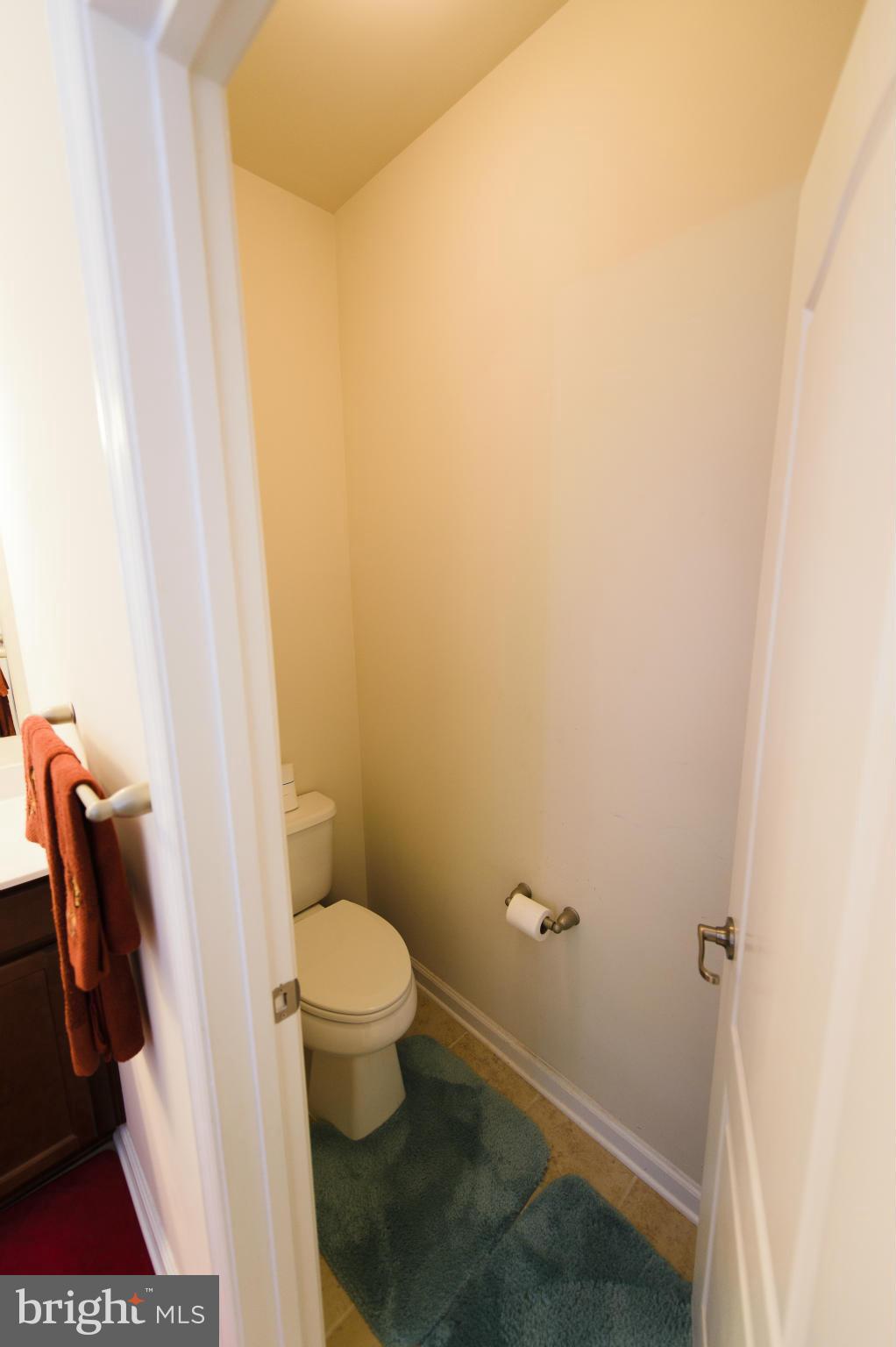 4878 Dane Ridge Circle, Unit 123 Woodbridge, VA 22193 - Photo 18 of 21 a bathroom with a toilet and a shower