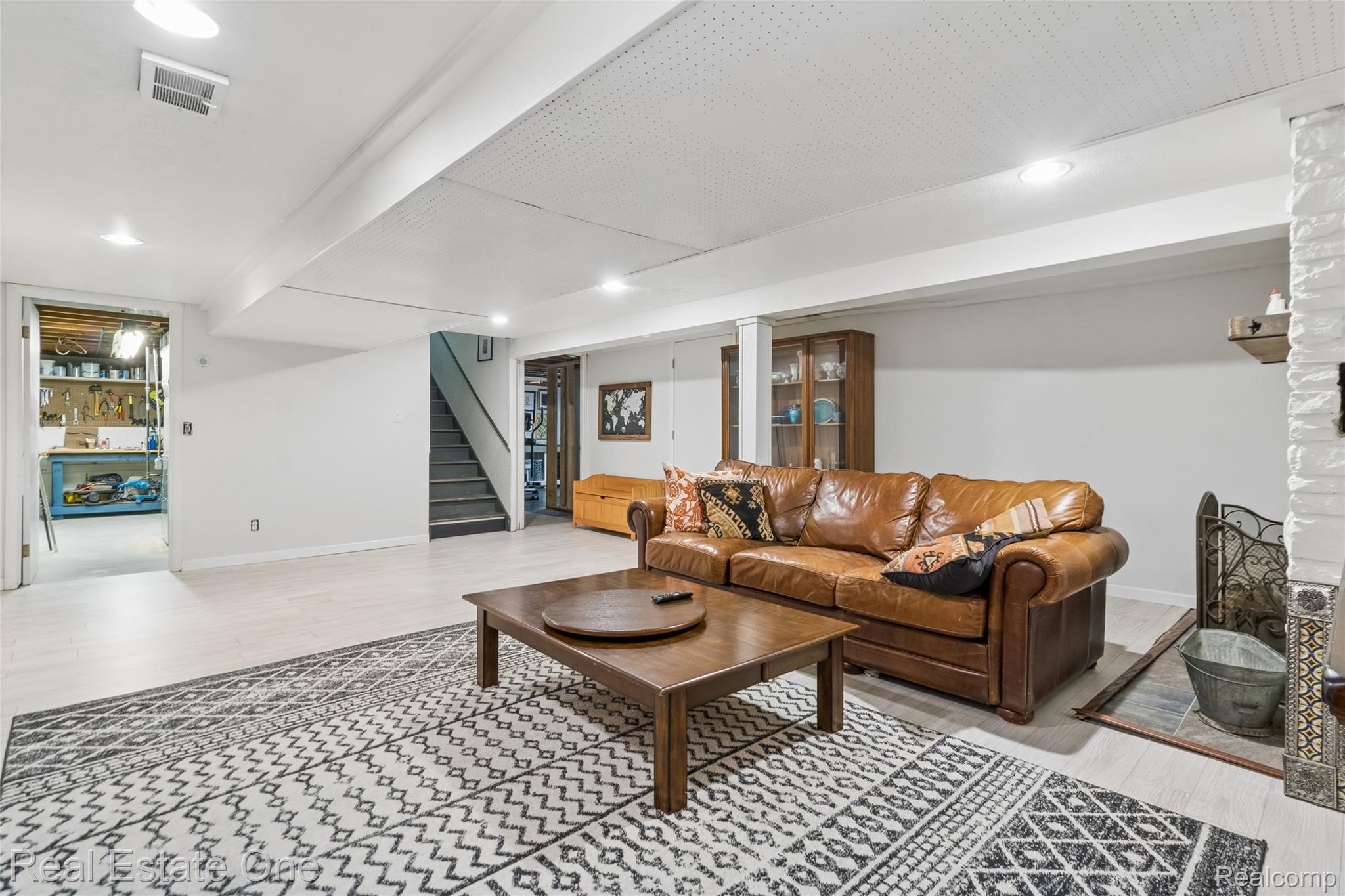 2189 Devonshire Road Bloomfield Hills, MI 48302 - Photo 35 of 50 Spacious lower-level area with light wood-finish flooring and recessed lighting