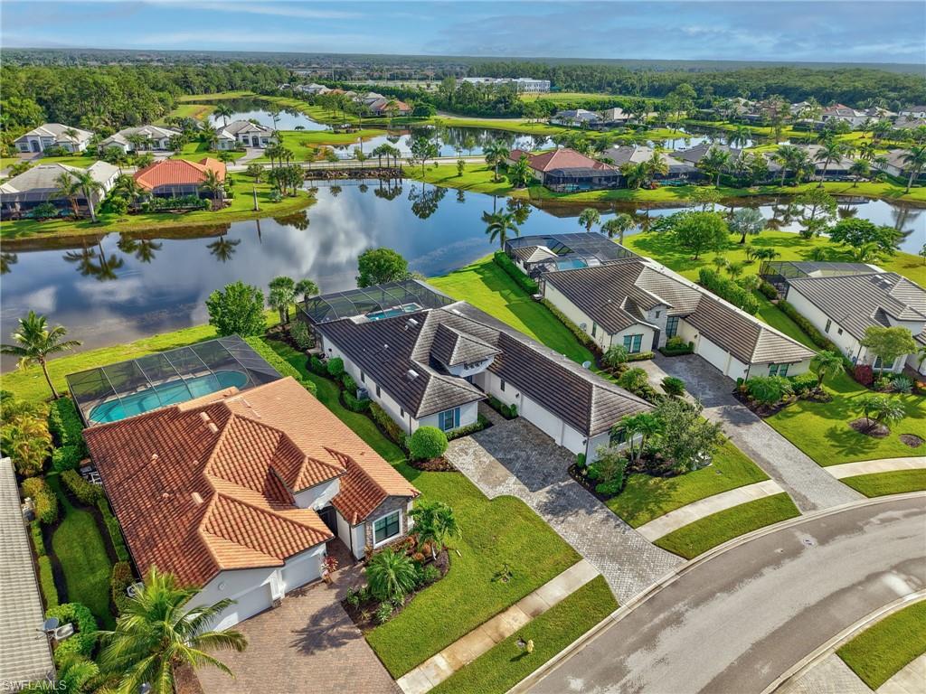 2079 Antigua Lane Naples, FL 34120 - Photo 2 of 44 Aerial view of residential area featuring a large body of water
