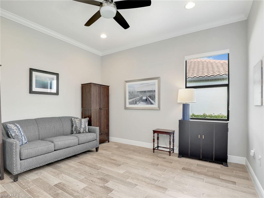 2079 Antigua Lane Naples, FL 34120 - Photo 30 of 44 Living room featuring plenty of natural light, ornamental molding, recessed lighting, light wood-style floors, and ceiling fan