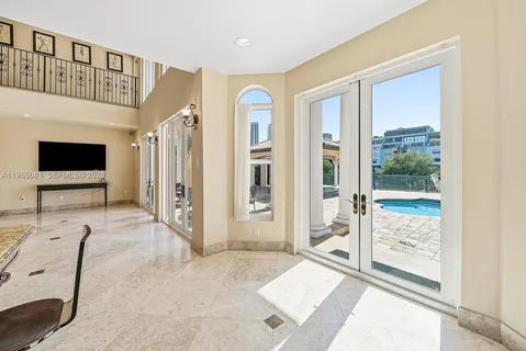 a view of a livingroom with furniture and front door