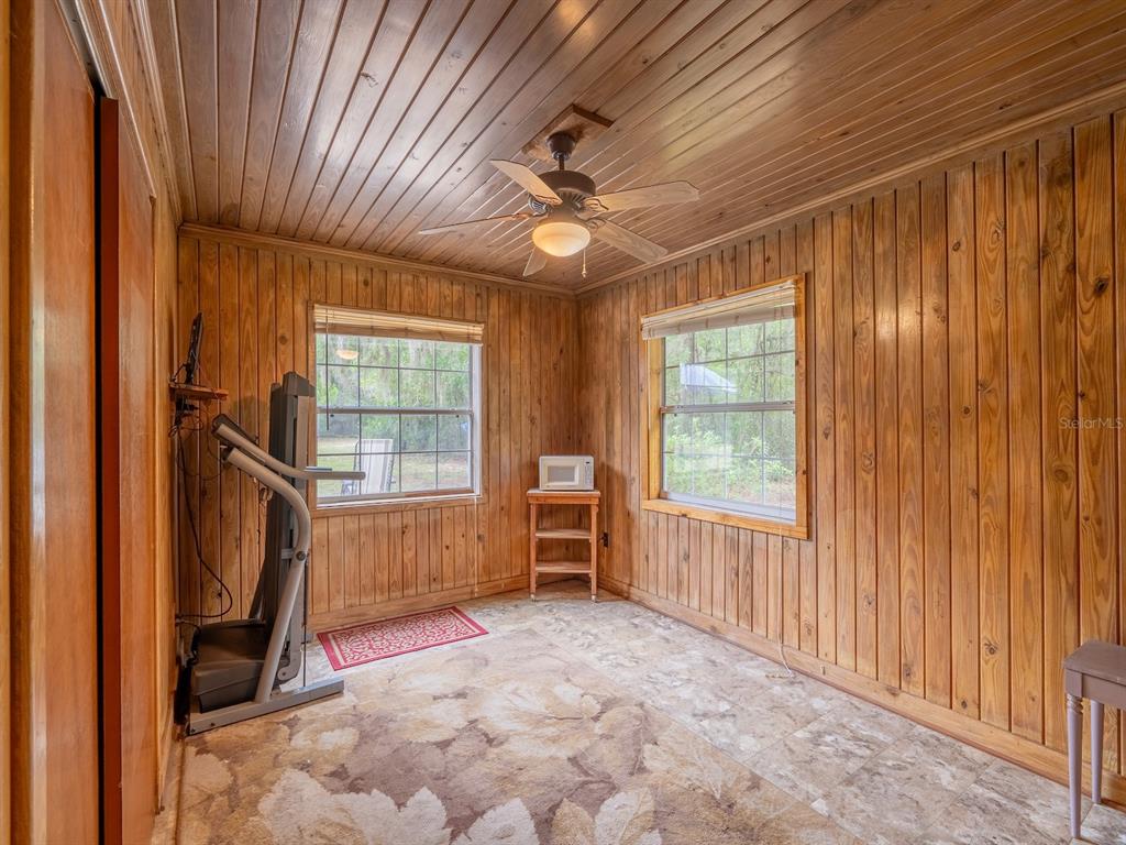 13668 Northeast 226th Avenue Road Fort McCoy, FL 32134 - Photo 16 of 37 a view of an empty room with a window