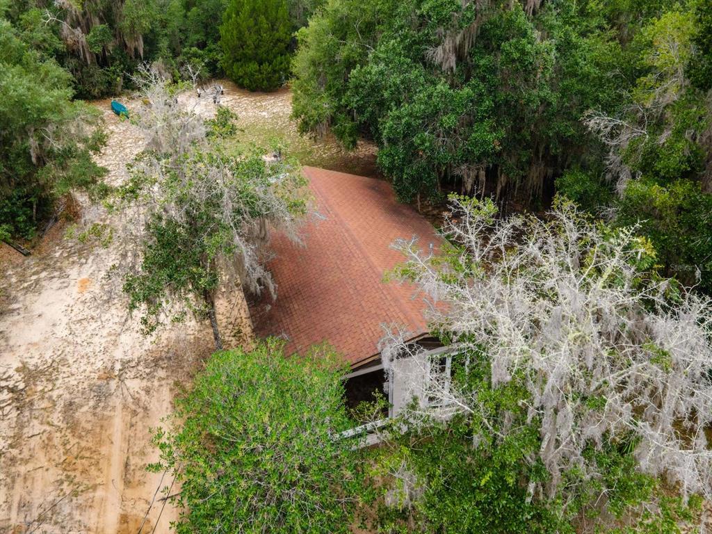 13668 Northeast 226th Avenue Road Fort McCoy, FL 32134 - Photo 34 of 37 an aerial view of residential house with green space
