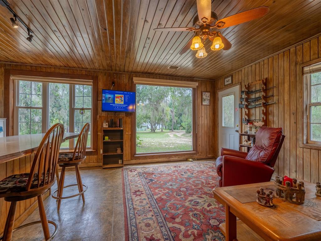 13668 Northeast 226th Avenue Road Fort McCoy, FL 32134 - Photo 6 of 37 a outdoor space with furniture