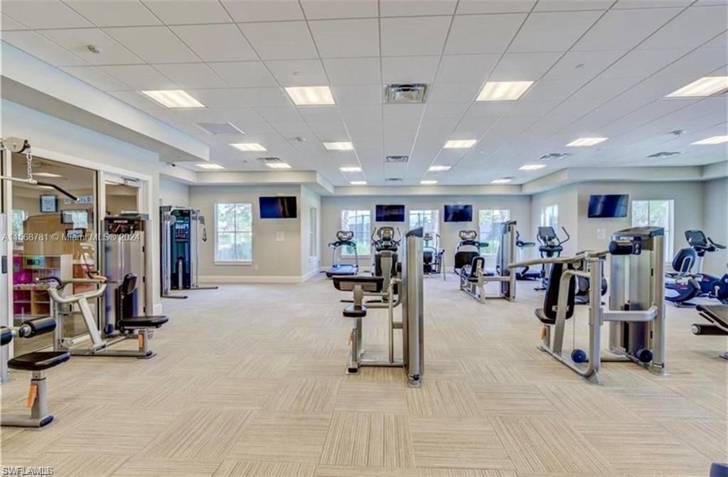 2876 Citrus Street Naples, FL 34120 - Photo 13 of 16 a view of a room with gym equipment
