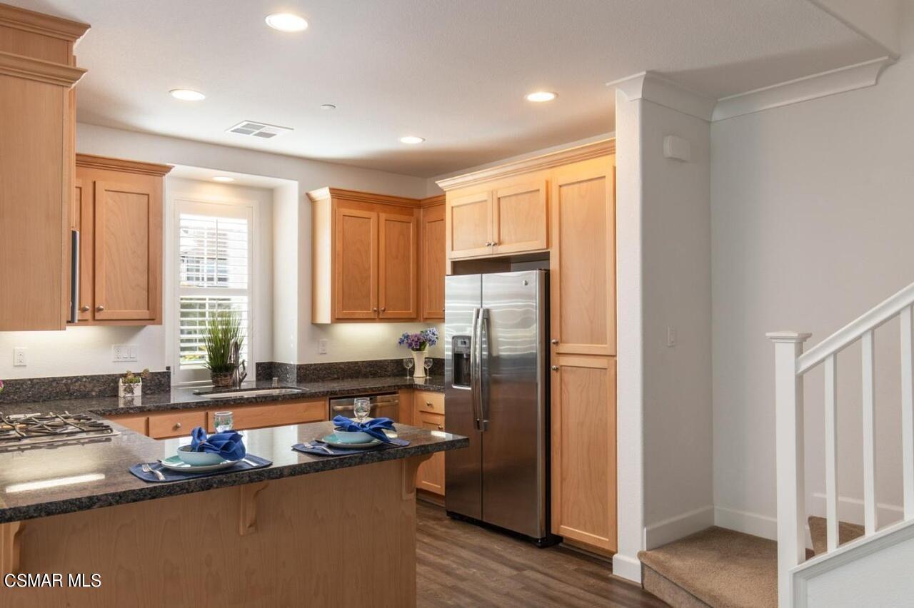 217 9th Street Marina, CA 93933 - Photo 5 of 17 a kitchen with refrigerator and window