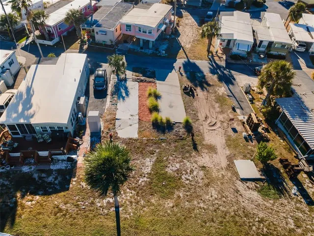 an aerial view of a house with a outdoor space