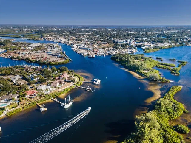 an aerial view of residential building and lake view
