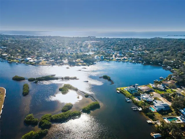 a terrace with outdoor seating and city view