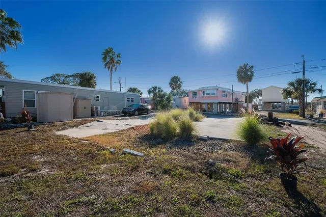 an aerial view of a house with a ocean view