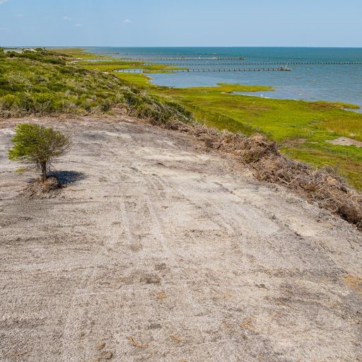 2415 1st Street Bayside, TX 78340 - Photo 11 of 18 a view of an ocean and beach