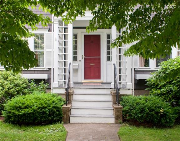 28 Manemet Road Newton, MA 02459 - Photo 1 of 15 a view of a house with a yard and plants