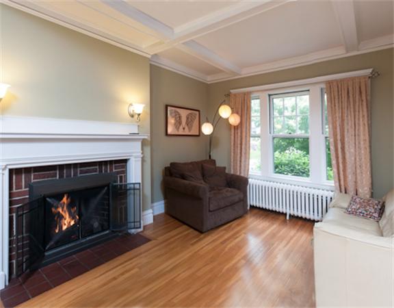 28 Manemet Road Newton, MA 02459 - Photo 6 of 15 a living room with furniture and a fireplace