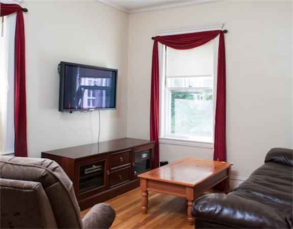 28 Manemet Road Newton, MA 02459 - Photo 10 of 15 a living room with furniture and a window