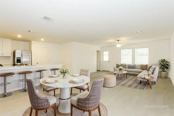 a view of a dining room with furniture