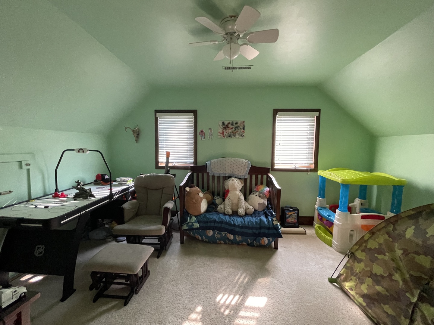 204 Locust Street Sublette, IL 61367 - Photo 11 of 17 a living room with furniture and a chandelier
