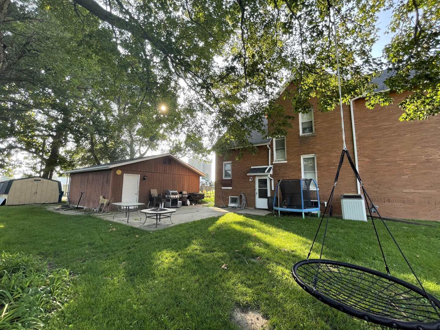 204 Locust Street Sublette, IL 61367 - Photo 2 of 17 a view of a house with backyard porch and sitting area