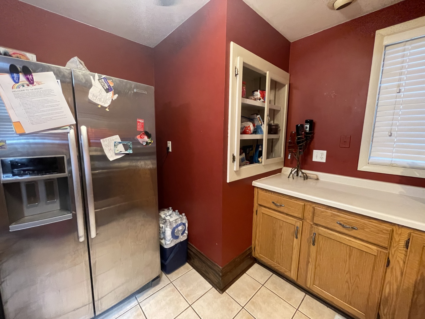 204 Locust Street Sublette, IL 61367 - Photo 4 of 17 a kitchen with stainless steel appliances granite countertop a refrigerator and a sink