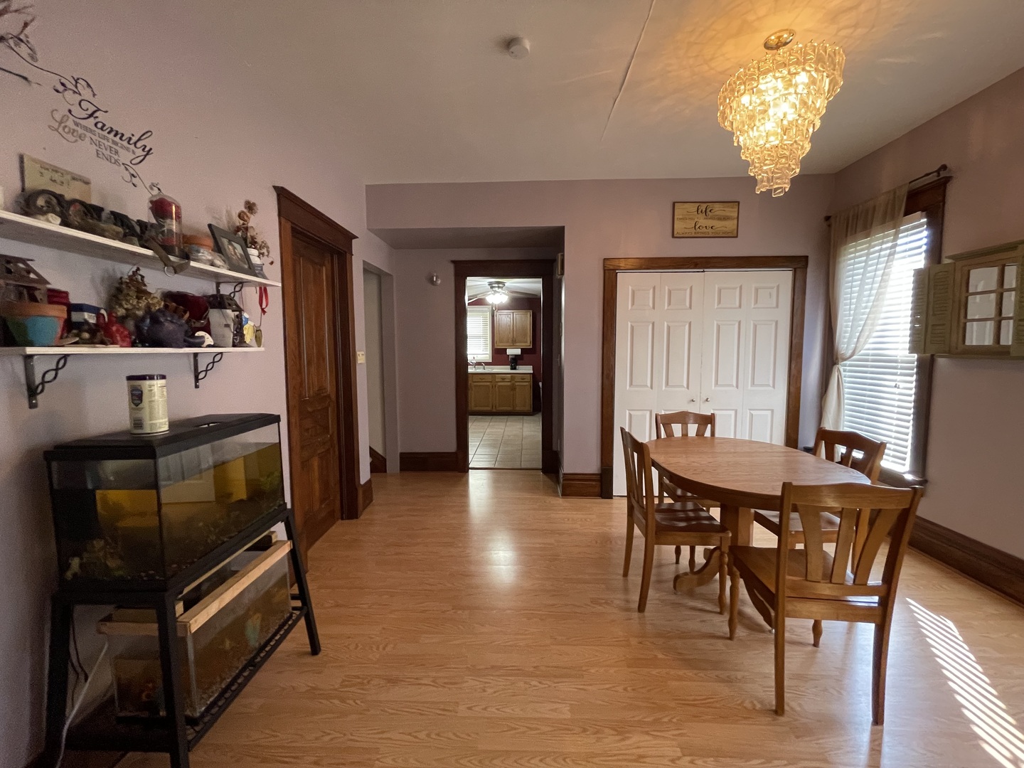 204 Locust Street Sublette, IL 61367 - Photo 6 of 17 a view of a dining room with furniture and chandelier