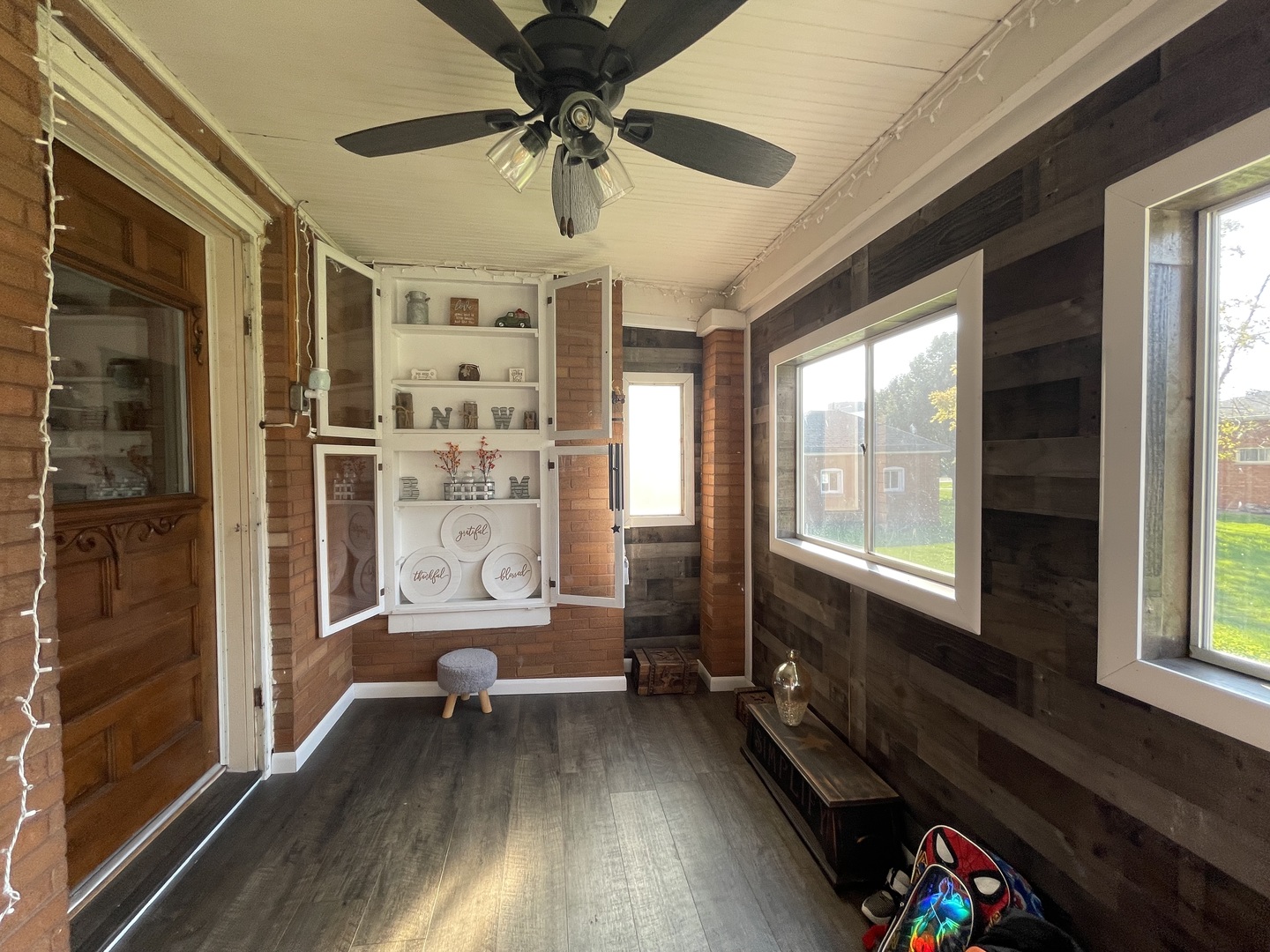 204 Locust Street Sublette, IL 61367 - Photo 8 of 17 a living room with furniture and a window