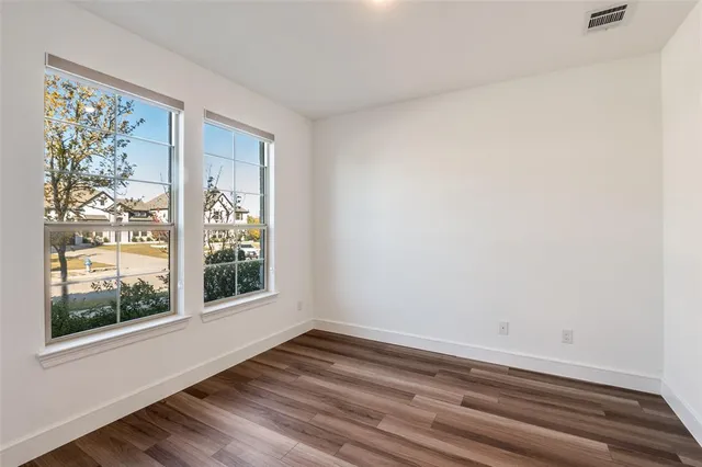 a view of a room that has a window