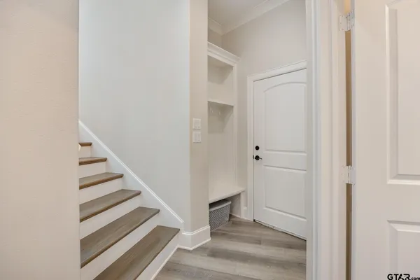 a view of a livingroom with wooden floor