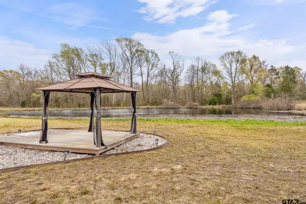 a view of a backyard of a house