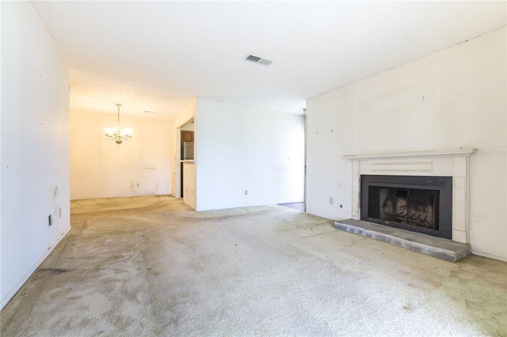 302 Countryside Place Smyrna, GA 30080 - Photo 2 of 19 a view of empty room with a fireplace
