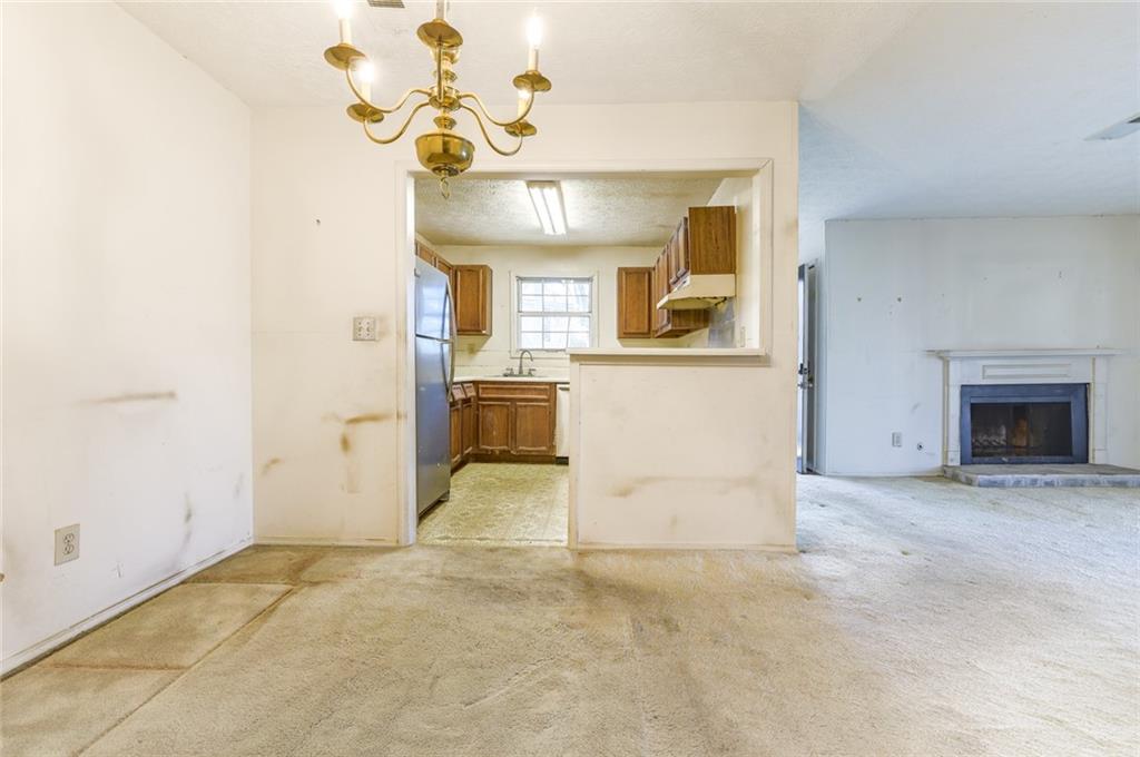 302 Countryside Place Smyrna, GA 30080 - Photo 5 of 19 a view of a livingroom with a chandelier