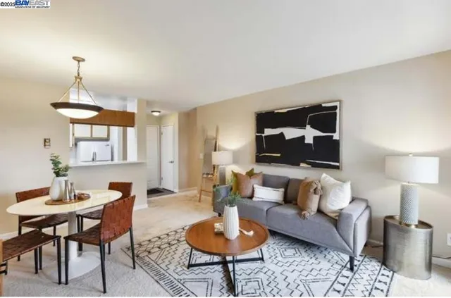 a living room with furniture a lamp and a lamp