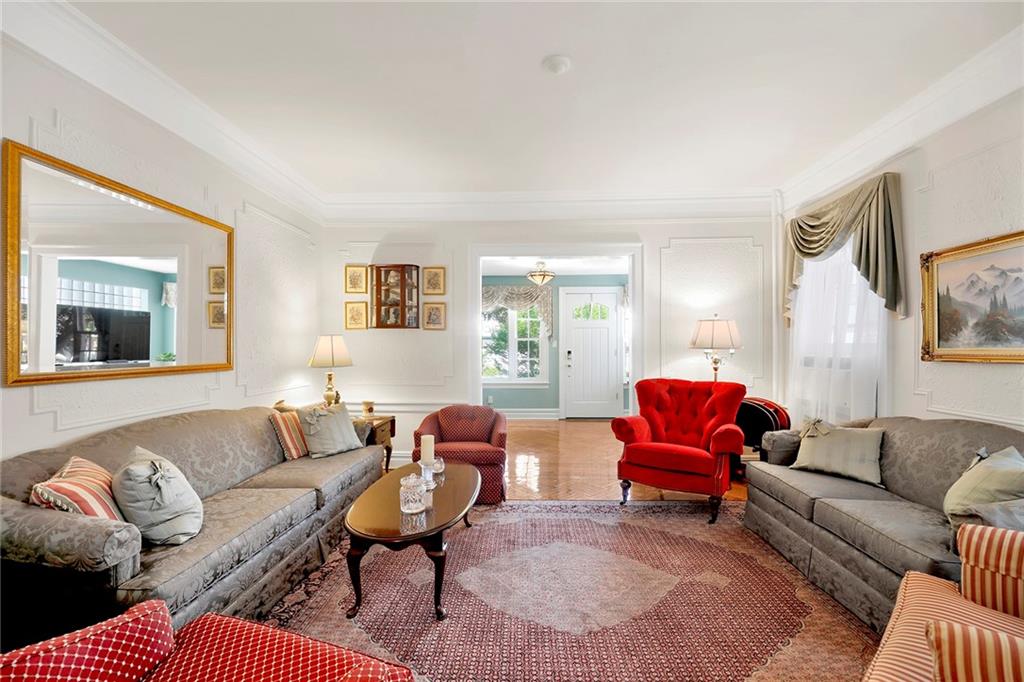 7607 Colonial Road Brooklyn, NY 11209 - Photo 4 of 35 a living room with furniture a rug and a window