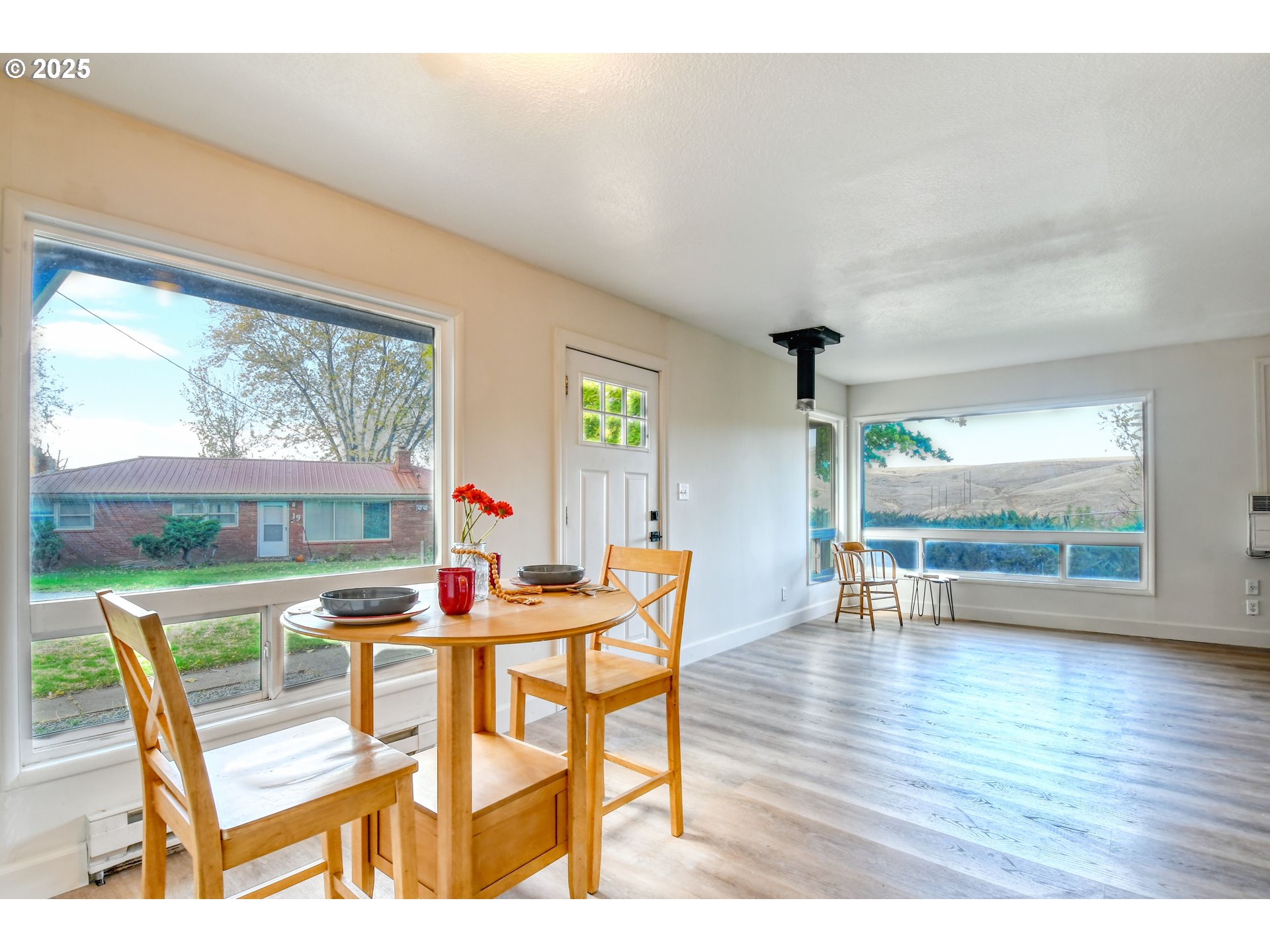 20 Northeast Nelson Drive Pendleton, OR 97801 - Photo 11 of 35 a dining room with furniture and wooden floor