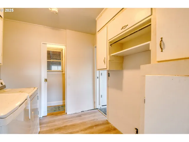 a view of a kitchen with a sink