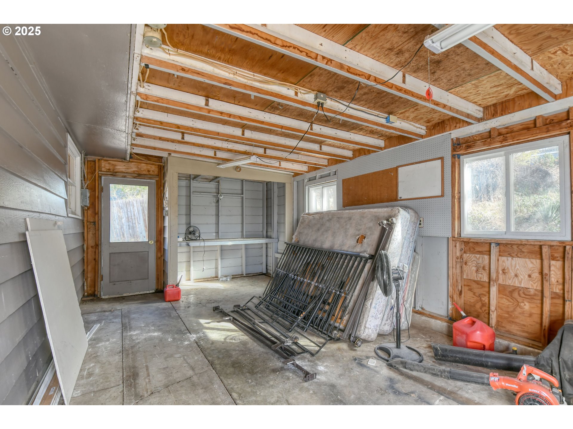 20 Northeast Nelson Drive Pendleton, OR 97801 - Photo 28 of 35 a view of a room with wooden floor and windows