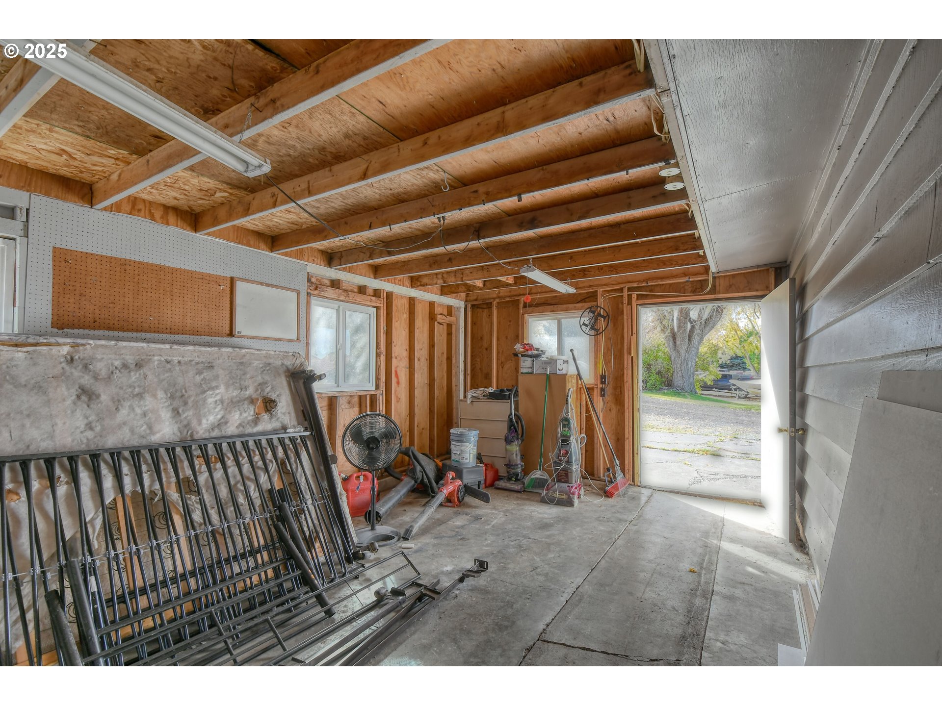 20 Northeast Nelson Drive Pendleton, OR 97801 - Photo 29 of 35 a view of an empty room with wooden floor and a window
