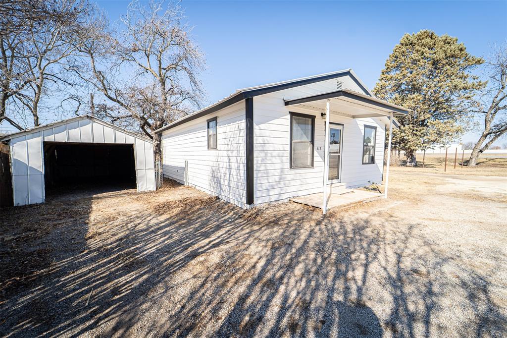 618 Oak Street Clyde, TX 79510 - Photo 2 of 39 a view of a house with a yard