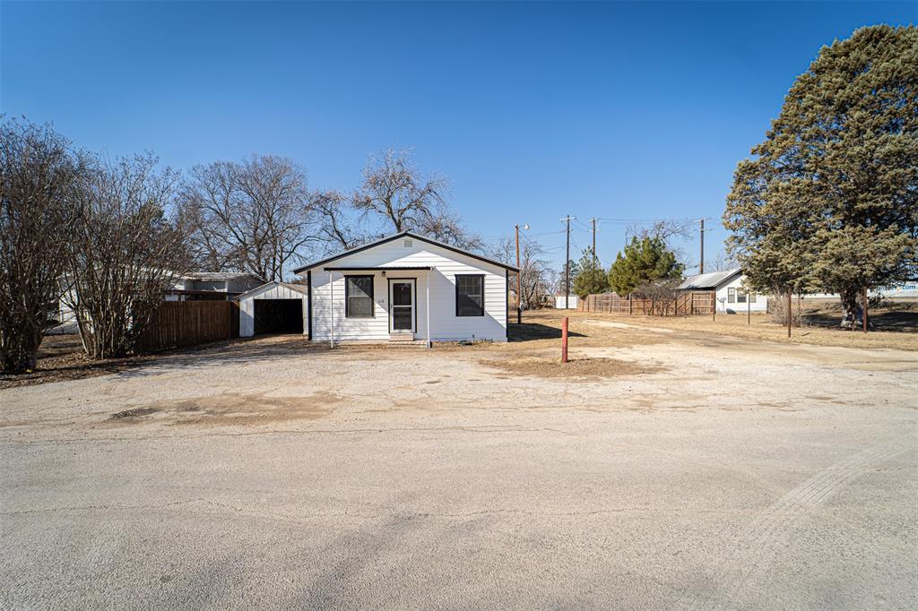 618 Oak Street Clyde, TX 79510 - Photo 31 of 39 a front view of a house with a yard
