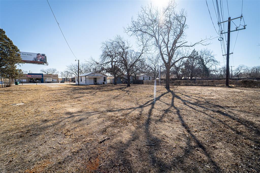618 Oak Street Clyde, TX 79510 - Photo 37 of 39 a view of a yard with trees and covered with snow