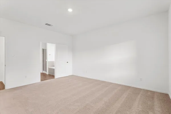 a bathroom with a sink a mirror and shower